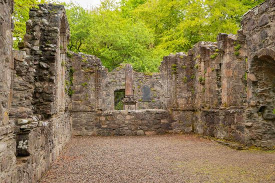 Hidden among the trees on the castle grounds, the ruins of Dunstaffnage Castle Chapel