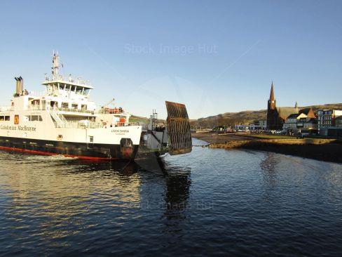 Ferry Docking At Seaside Town Of Largs