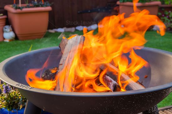 Bright Orange Flames From Firepit