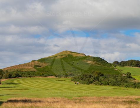Two Golfers Enjoying The Summer Sunshine