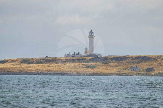 Lighthouse on it\\\'s own little island just of the coast of Arran, Scotland
