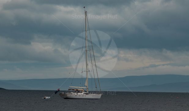 Beautiful yacht getting ready to head out to sea on a calm day
