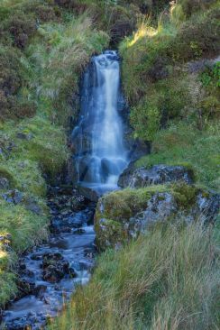 A small waterfall just after a heavy rainfall in the Scottish Highlands