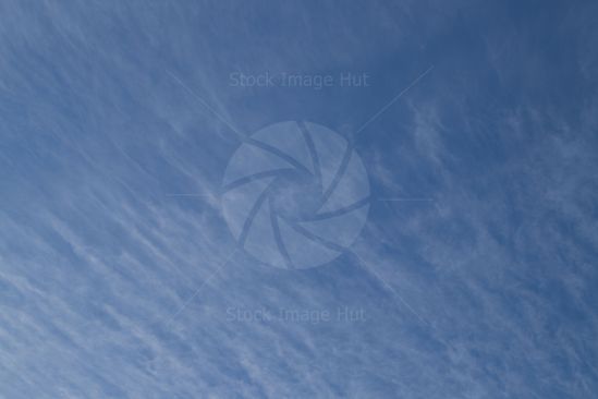 Clouds streaking across summer sky