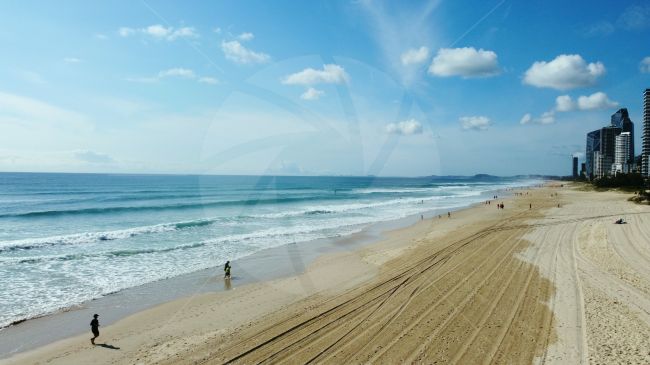 Drone shot of the golden sands at surfers paradise beach in Queensland, Australia