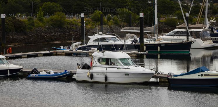 Boats tied up in marina